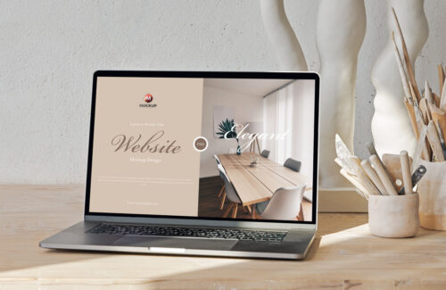 Free Laptop on Wooden Table Website Mockup Design